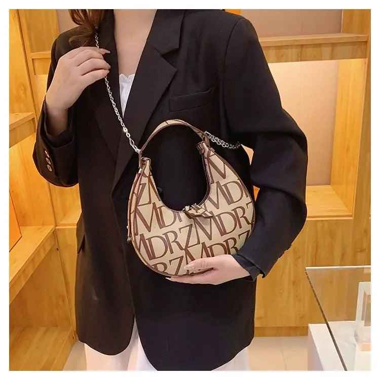 Women’s Crossbody Bag - Dumpling PU Chain - MRC STOREAccessoriesMy StoreWomen’s Crossbody Bag - Dumpling PU ChainMRC STORECJNS198803201AZBrown